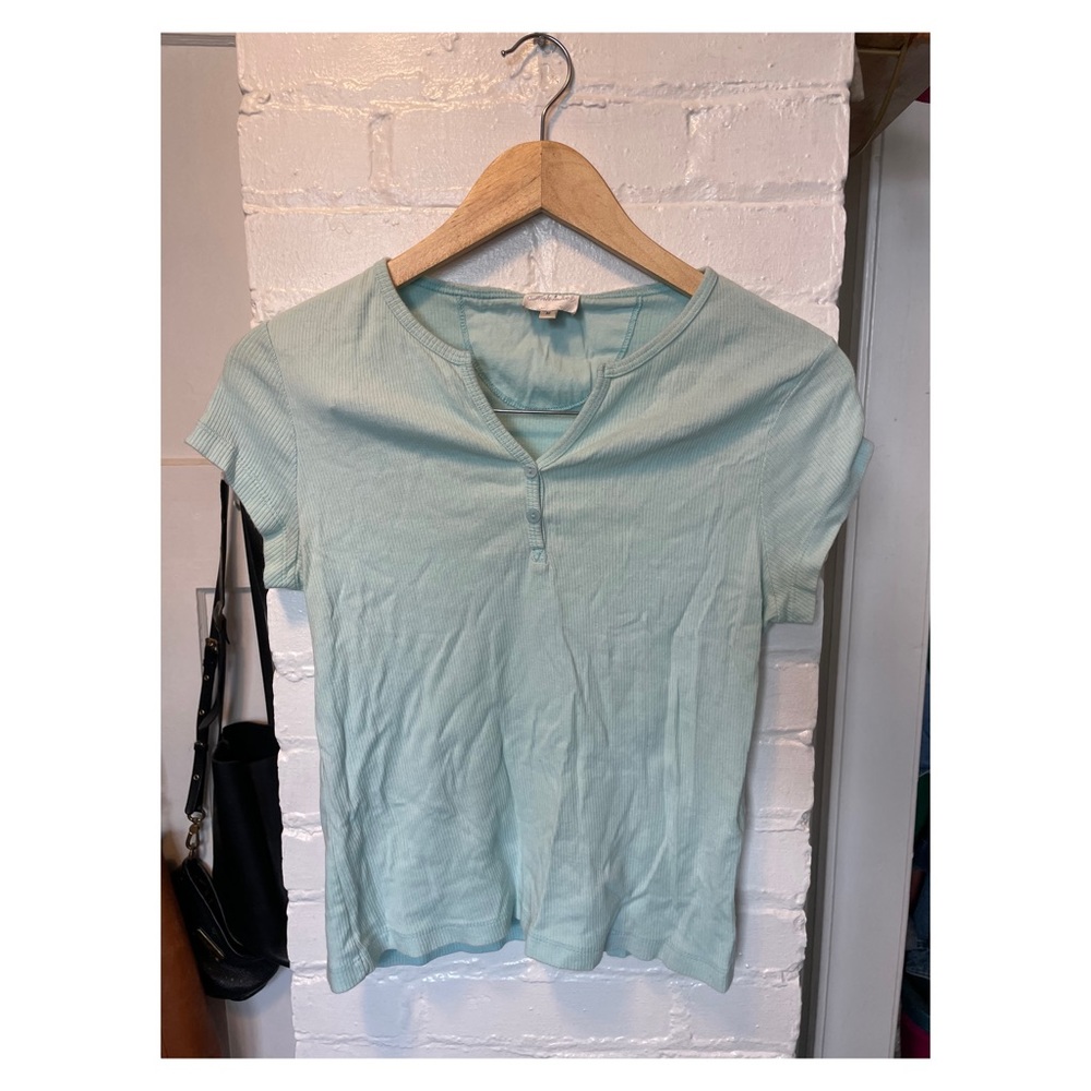 3/30$ baby blue baby tee